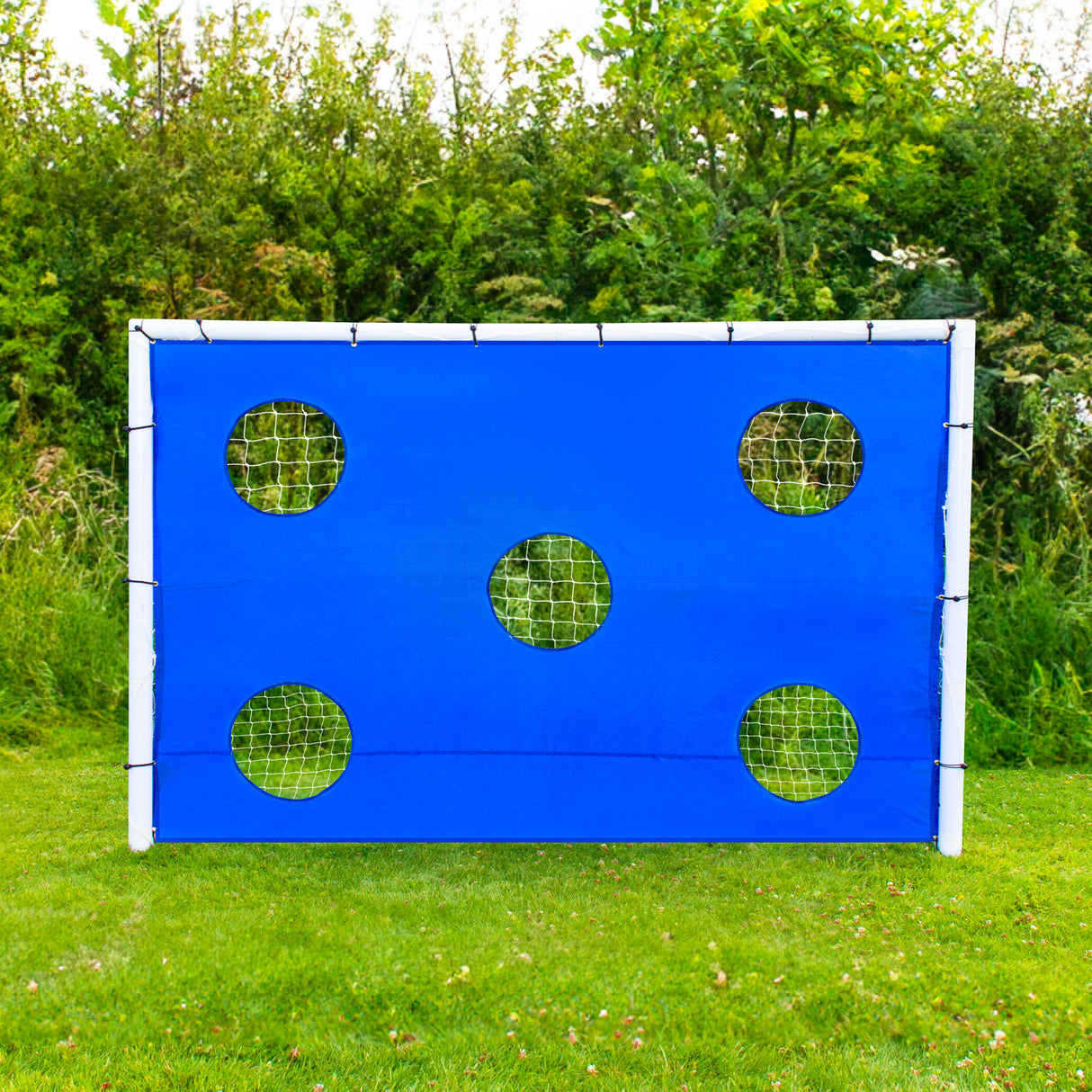 Sechseckige Zielscheibe für Fußballtor in leuchtendem Blau mit fünf runden Löchern, ideal für das Training von Schüssen und Zielgenauigkeit
