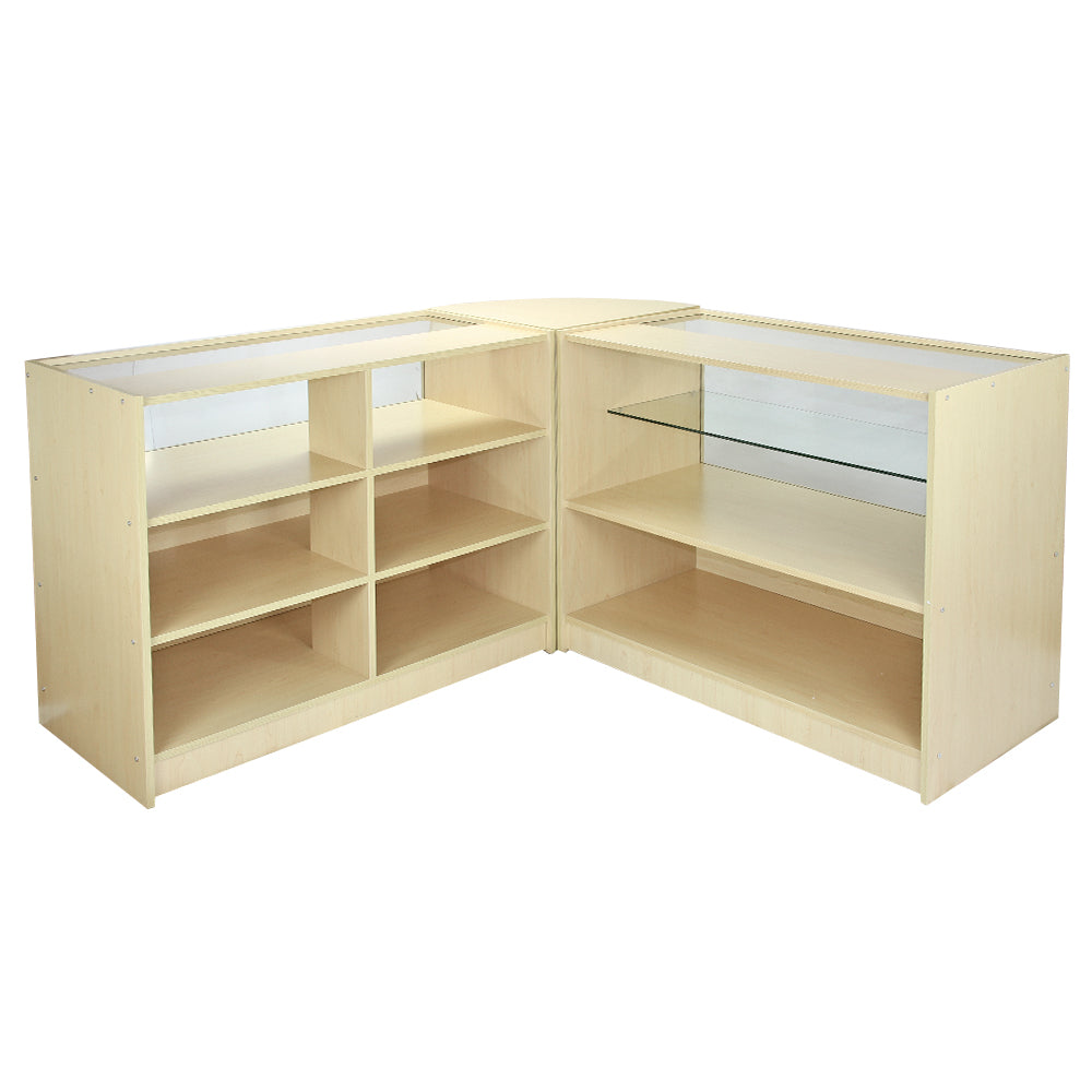 Eckregal aus hellem Holz mit offenen Fächern und Glasablagen, ideal zur Präsentation von Kosmos-Zählern und anderen Produkten