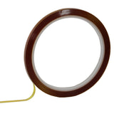 Brauner, transparenter Klebeband-Roller mit gelbem Träger, ideal für die Anwendung in der Schilderherstellung und beim Vinylschneiden