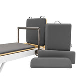Pilates Reformer Maschine aus Aluminium mit grauem Polster, verstellbaren Rückenlehnen und ergonomischem Design für effektives Training