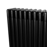 Schwarzer Röhrenheizkörper mit vier Säulen, 600mm x 1190mm, glänzende Oberfläche und modernes, elegantes Design für effiziente Wärmeabgabe